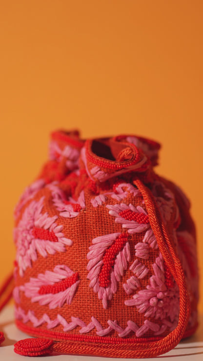 Red with pink flowers bucket bag