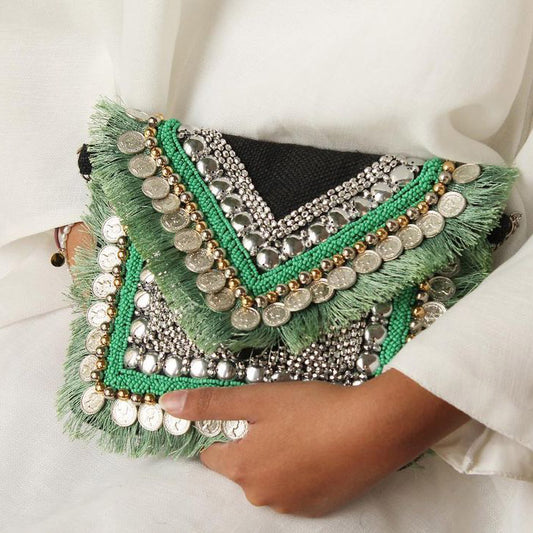 Black and light green clutch