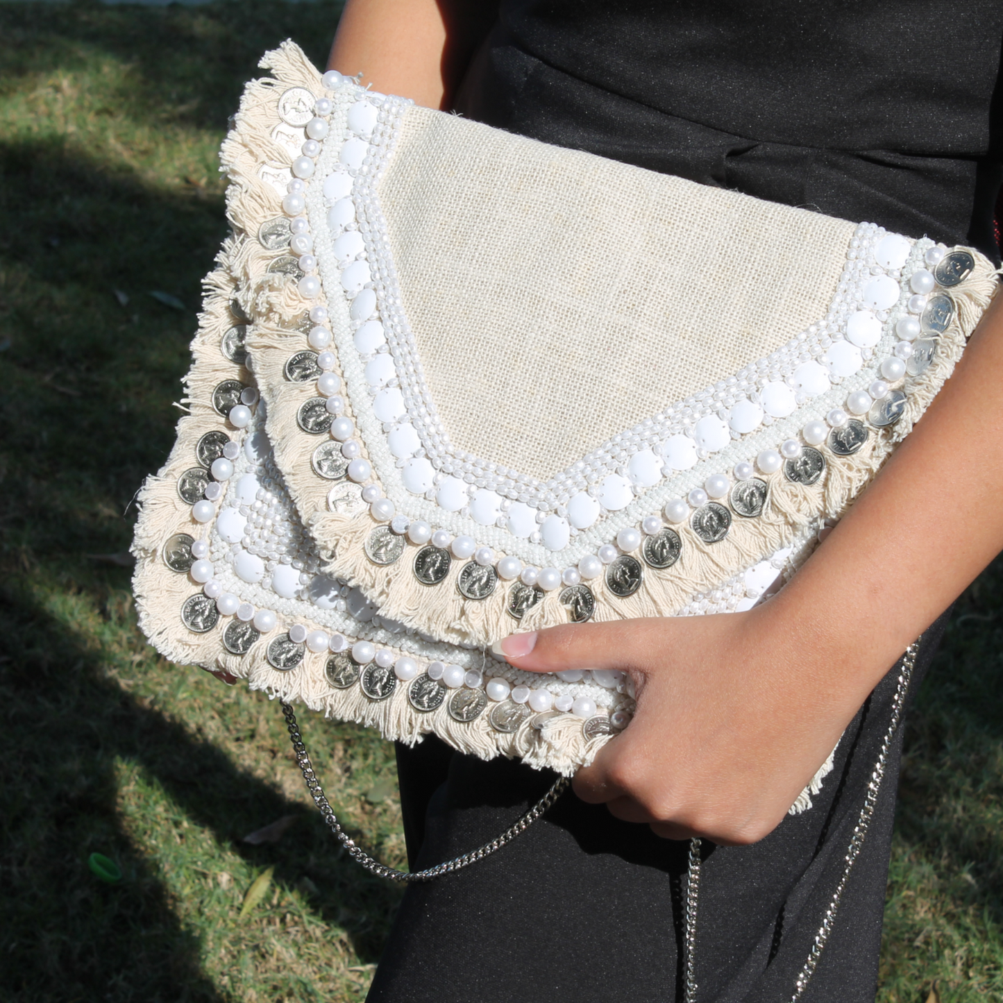 pearls & beige clutch