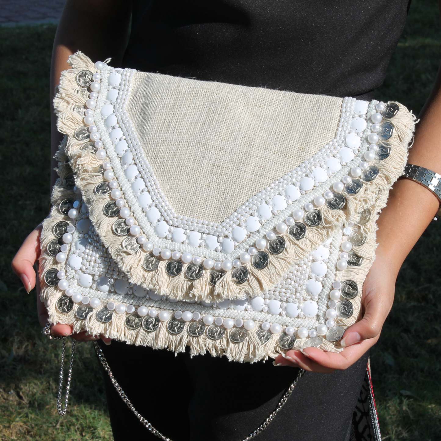 pearls & beige clutch